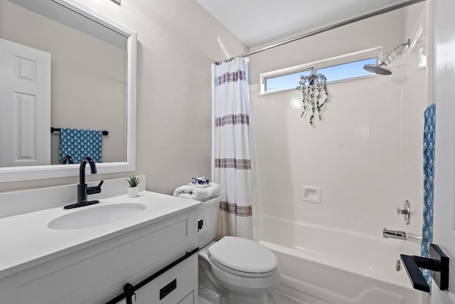 bathroom featuring vanity, toilet, and shower / tub combo with curtain