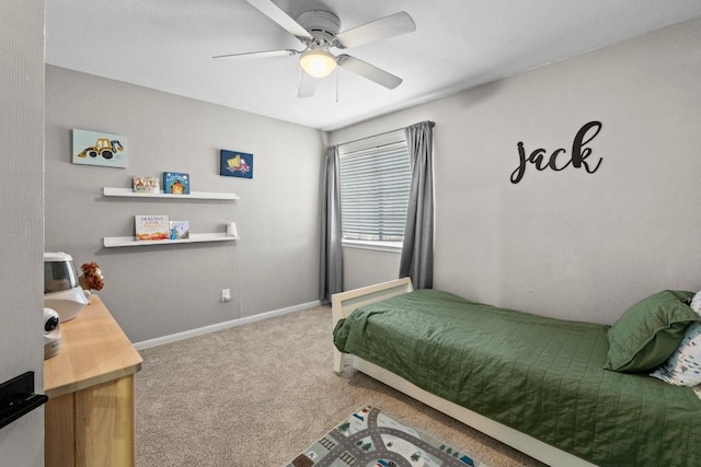 bedroom with baseboards, carpet, and a ceiling fan