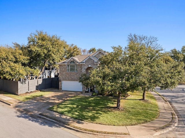 view of front of property featuring a front lawn, driveway, fence, a garage, and brick siding