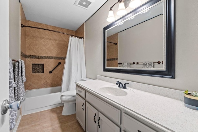 bathroom with visible vents, toilet, vanity, and shower / tub combo with curtain