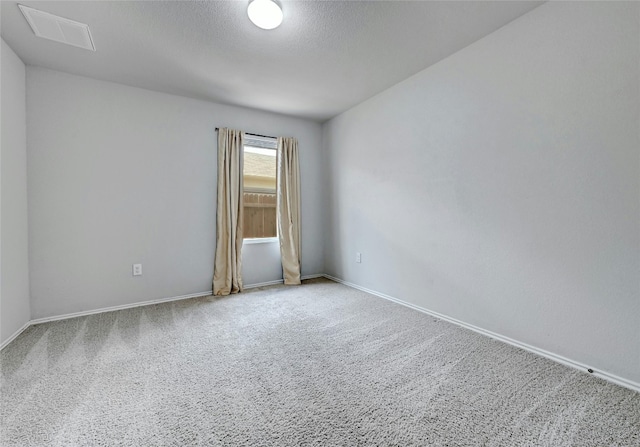 5800 Shanjia Dr, Austin, TX 78724 - carpeted empty room with baseboards and a textured ceiling