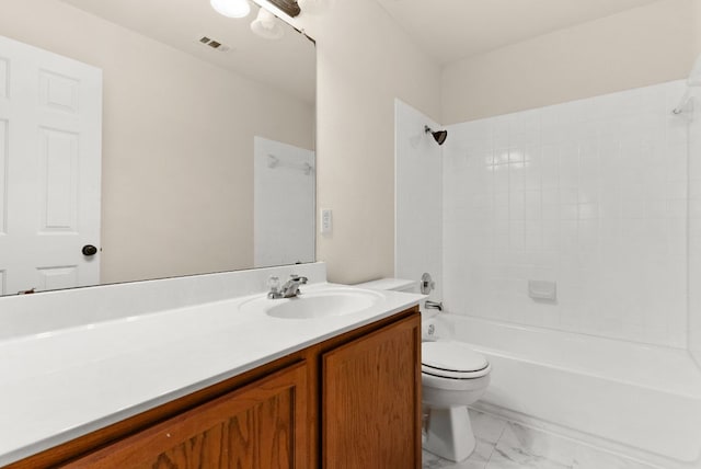 9812 Cow Page Ct, Temple, TX 76502 - bathroom featuring visible vents, toilet, marble finish floor, shower / washtub combination, and vanity