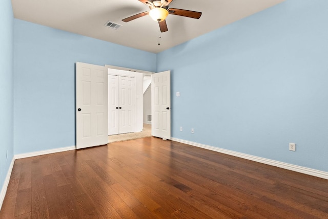 9812 Cow Page Ct, Temple, TX 76502 - unfurnished bedroom featuring a closet, visible vents, baseboards, and wood finished floors