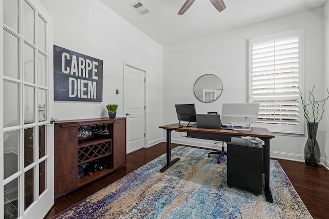 office area featuring visible vents, baseboards, ceiling fan, and wood finished floors