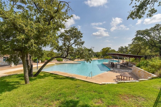 community pool with a lawn