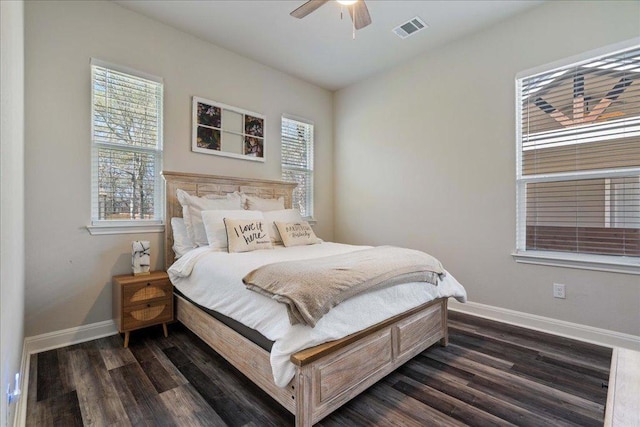 190 Waikakaaua Dr, Bastrop, TX 78602 - bedroom with baseboards, dark wood-type flooring, and ceiling fan