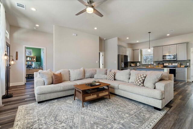 190 Waikakaaua Dr, Bastrop, TX 78602 - living area with ceiling fan, dark wood-type flooring, recessed lighting, and baseboards