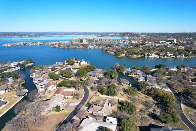 107 Boot Hl, Horseshoe Bay, TX 78657 - aerial view of property and surrounding area featuring a nearby body of water and nearby suburban area