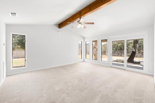 empty room with a ceiling fan, vaulted ceiling with beams, light colored carpet, and visible vents