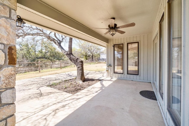 view of patio featuring ceiling fan