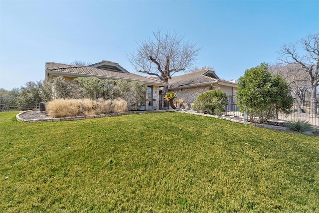 107 Boot Hl, Horseshoe Bay, TX 78657 - view of front of property with a tile roof and stone siding