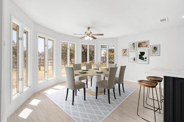 107 Boot Hl, Horseshoe Bay, TX 78657 - dining area featuring ceiling fan and baseboards