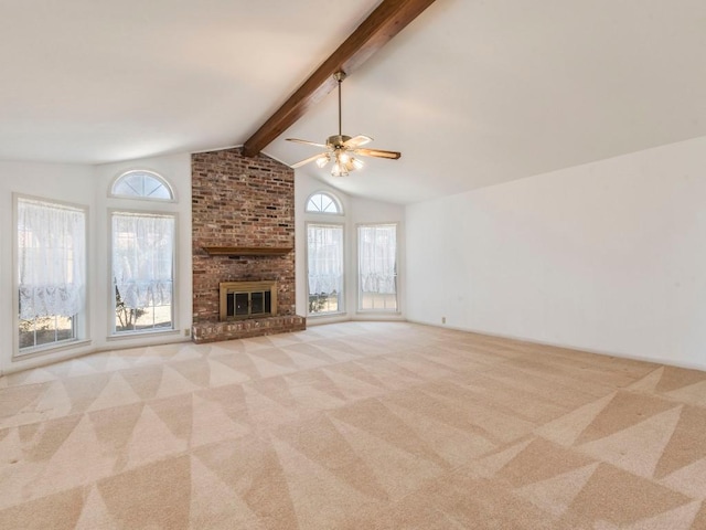 unfurnished living room featuring a fireplace, vaulted ceiling with beams, a ceiling fan, and carpet floors