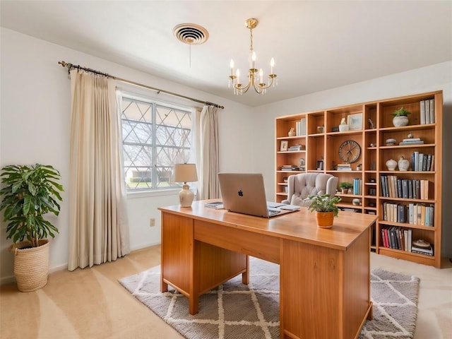 home office with visible vents, baseboards, light colored carpet, and an inviting chandelier