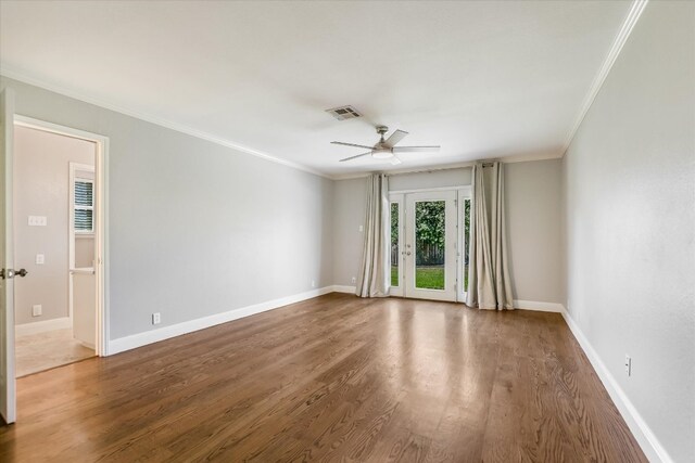 11402 Pencewood Dr, Austin, TX 78750 - spare room featuring a ceiling fan, wood finished floors, and crown molding