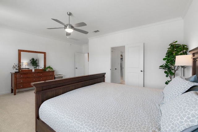 bedroom featuring light carpet, visible vents, a ceiling fan, and ornamental molding