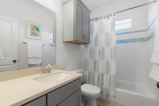 full bathroom with vanity, tile patterned floors, toilet, and shower / tub combo with curtain