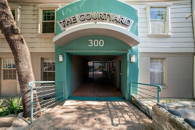 300 Crockett St Unit 118, Austin, TX 78704 - doorway to property with brick siding
