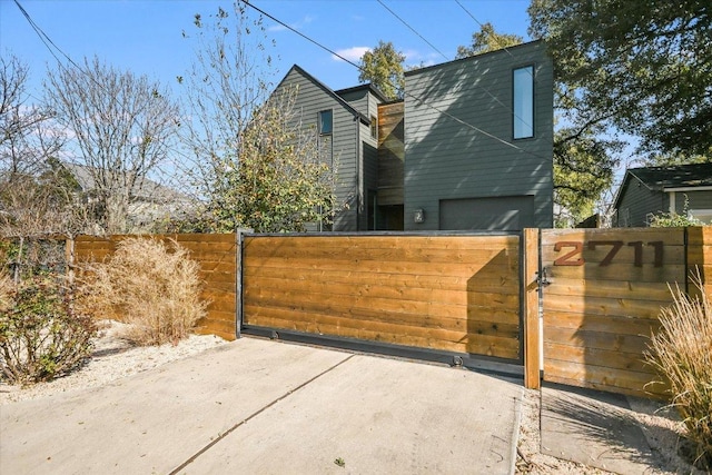 view of gate featuring fence