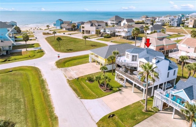 bird's eye view featuring a residential view and a water view