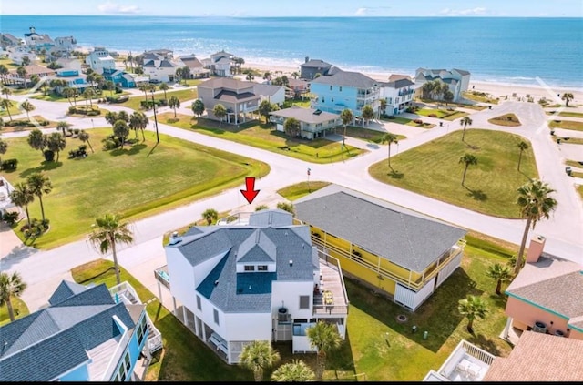 bird's eye view with a residential view and a water view