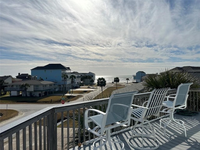 wooden terrace featuring a residential view