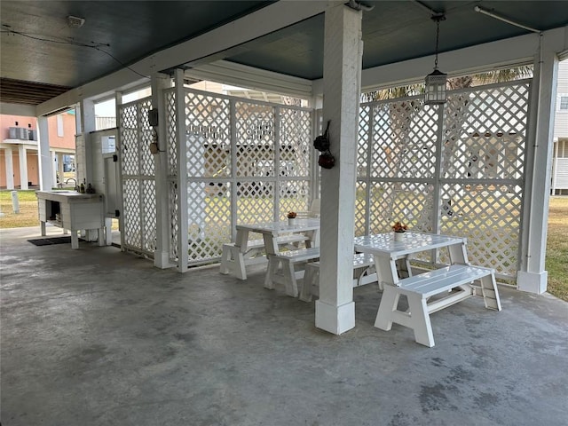 view of patio / terrace featuring outdoor dining space and fence