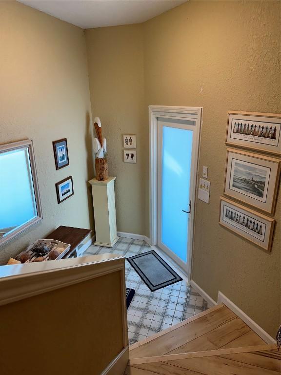 foyer with baseboards