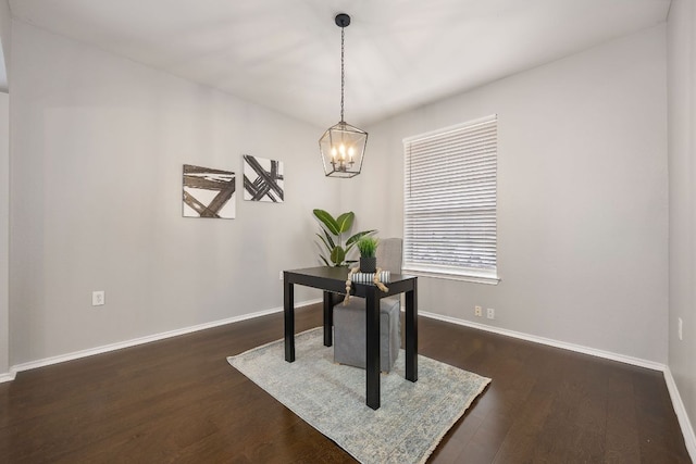 office featuring a chandelier, baseboards, and dark wood-style floors