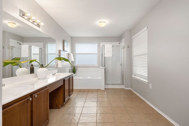 full bath with a shower stall, double vanity, a bath, tile patterned floors, and a sink