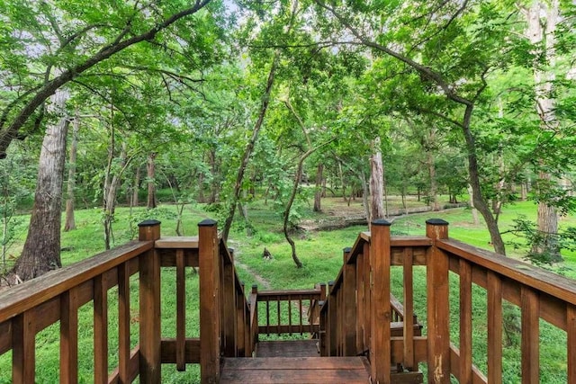 deck featuring a yard