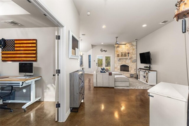 living room with recessed lighting, a stone fireplace, ceiling fan, and visible vents