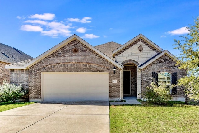 french country inspired facade featuring a garage, a front lawn, brick siding, and driveway