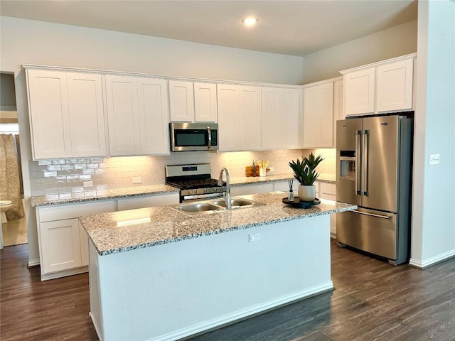 kitchen with appliances with stainless steel finishes and white cabinetry