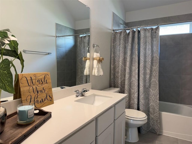 bathroom with toilet, tile patterned flooring, vanity, and shower / bath combination with curtain
