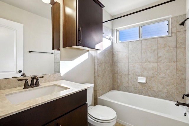 full bathroom featuring toilet, tub / shower combination, and vanity