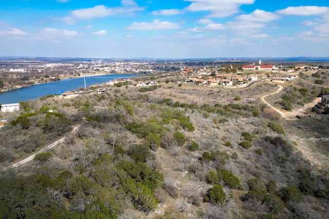 drone / aerial view featuring a water view