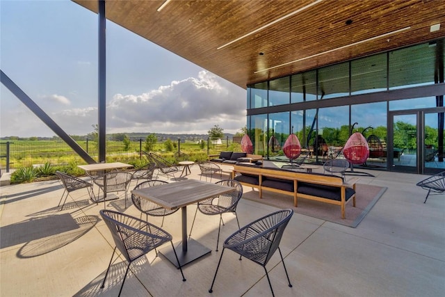 view of patio with a lanai