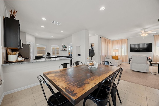 dining room featuring light tile patterned flooring, recessed lighting, visible vents, and ceiling fan