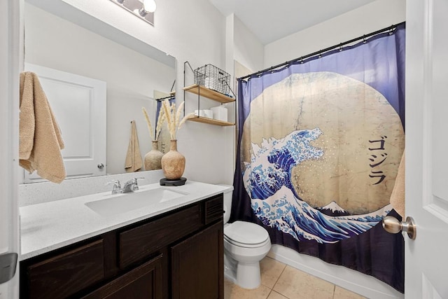 bathroom featuring a shower with shower curtain, toilet, vanity, and tile patterned flooring