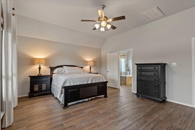 bedroom with a ceiling fan, wood finished floors, visible vents, baseboards, and lofted ceiling