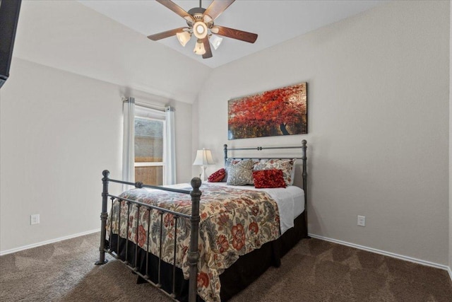 carpeted bedroom featuring baseboards, a ceiling fan, and vaulted ceiling