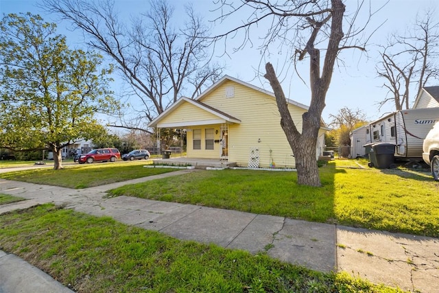 view of front of home featuring a front lawn