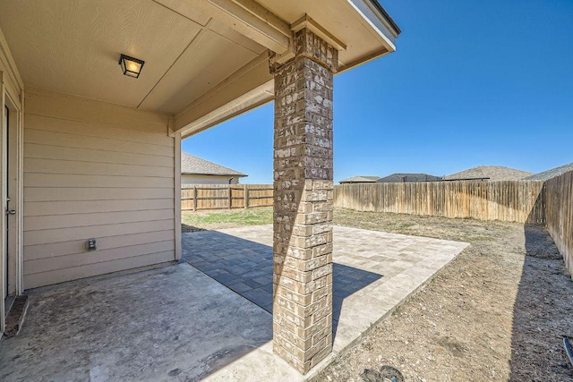 view of patio featuring a fenced backyard