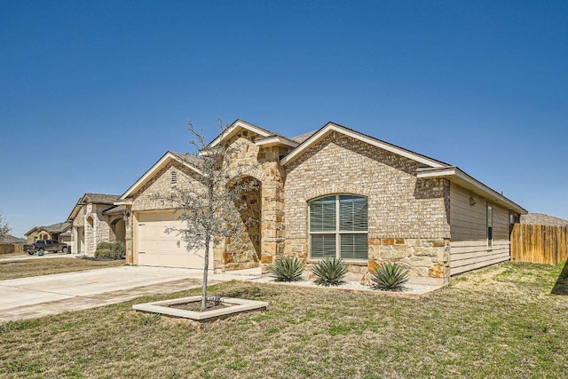 view of front of house featuring stone siding, a front lawn, concrete driveway, and a garage