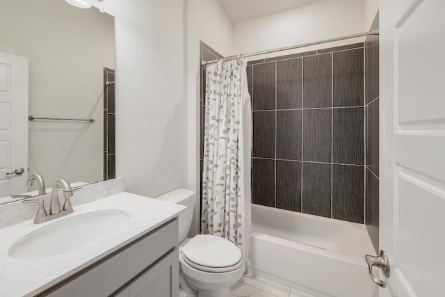 full bathroom with vanity, shower / tub combo, and toilet