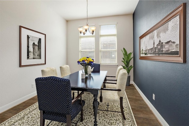 838 Kenney Fort Xing, Round Rock, TX 78665 - dining area with dark wood finished floors, a chandelier, baseboards, and a textured wall
