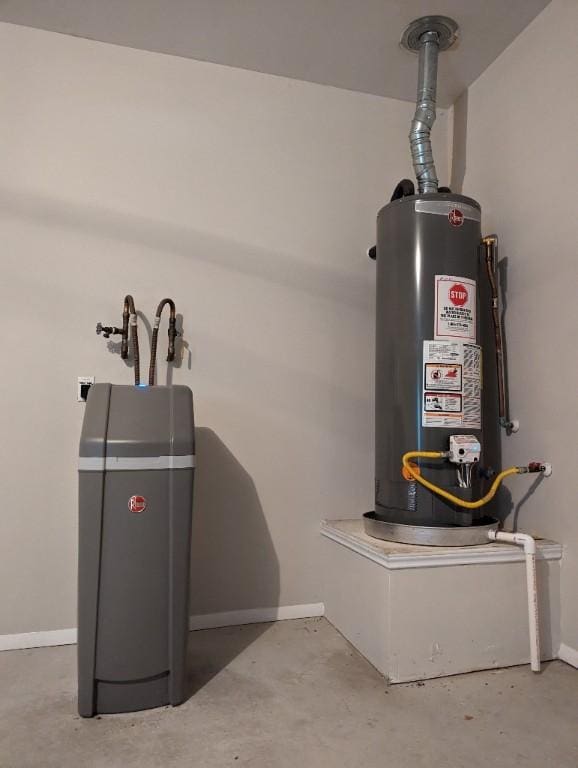 utility room with gas water heater