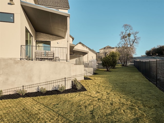 view of yard featuring fence