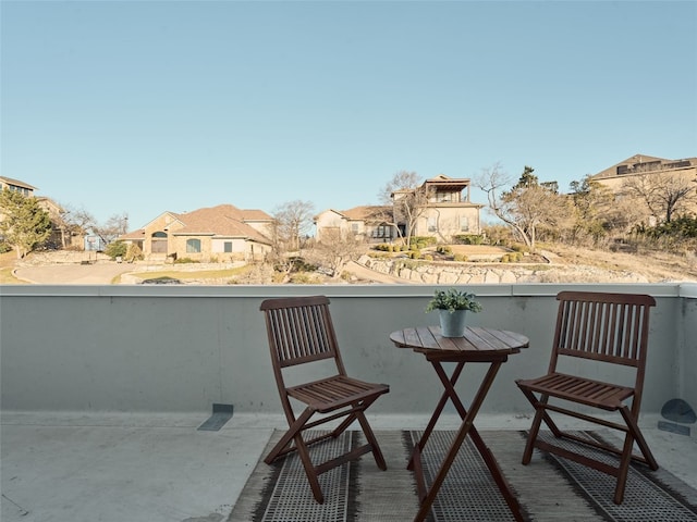 balcony featuring a residential view